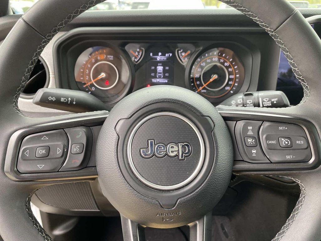 used 2025 Jeep Wrangler car, priced at $35,879