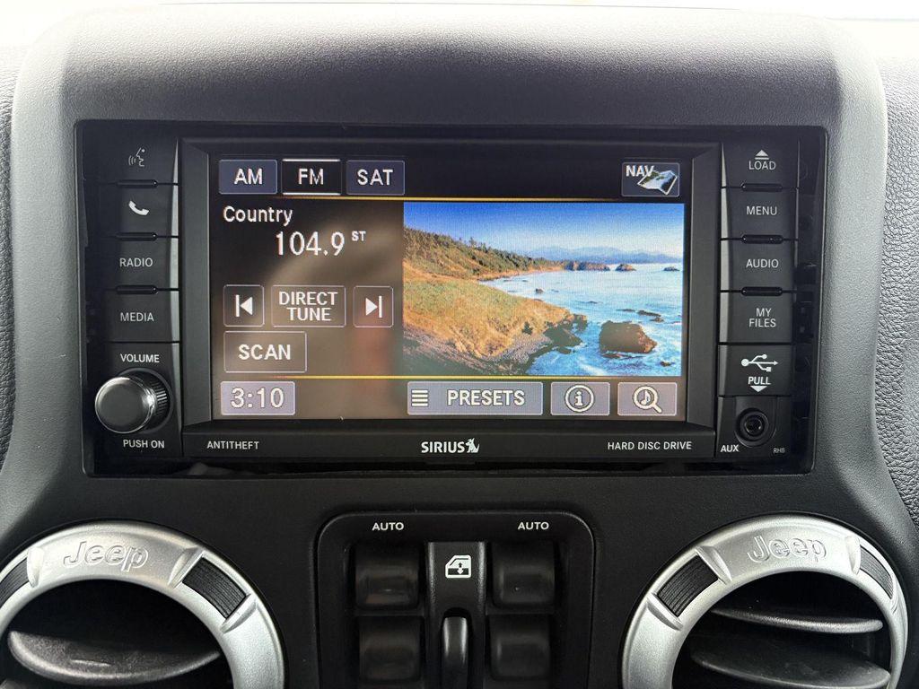 used 2016 Jeep Wrangler Unlimited car, priced at $22,396