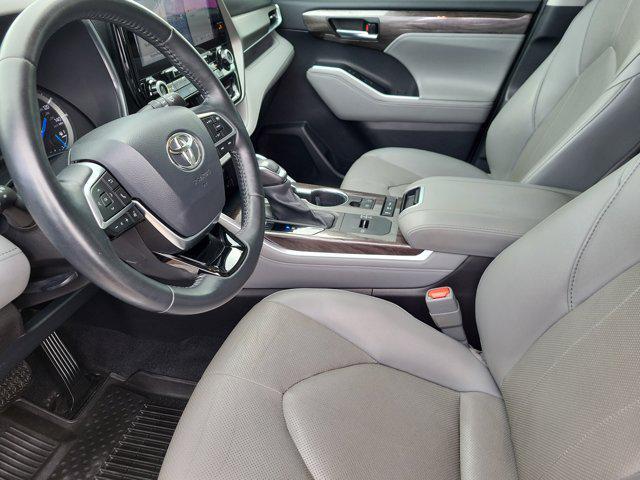 used 2021 Toyota Highlander Hybrid car, priced at $30,487