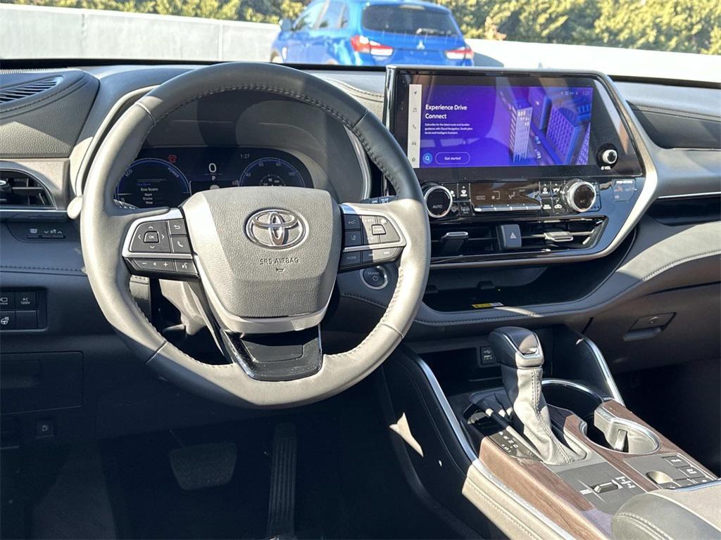 used 2025 Toyota Highlander Hybrid car, priced at $54,500