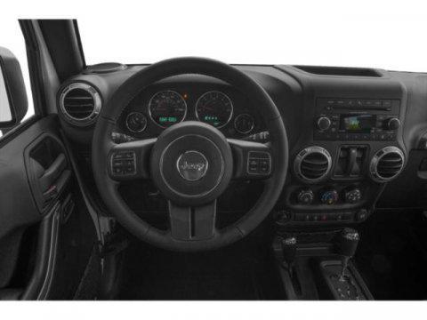 used 2015 Jeep Wrangler car, priced at $15,999