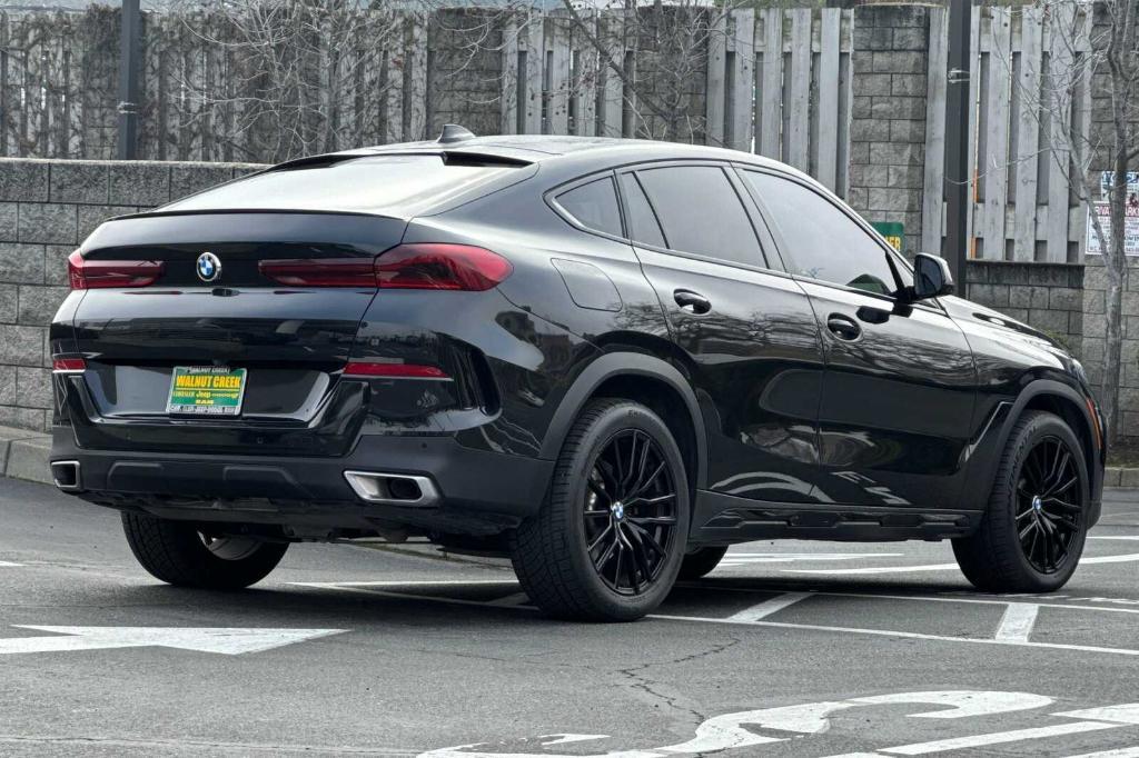 used 2023 BMW X6 car, priced at $49,200