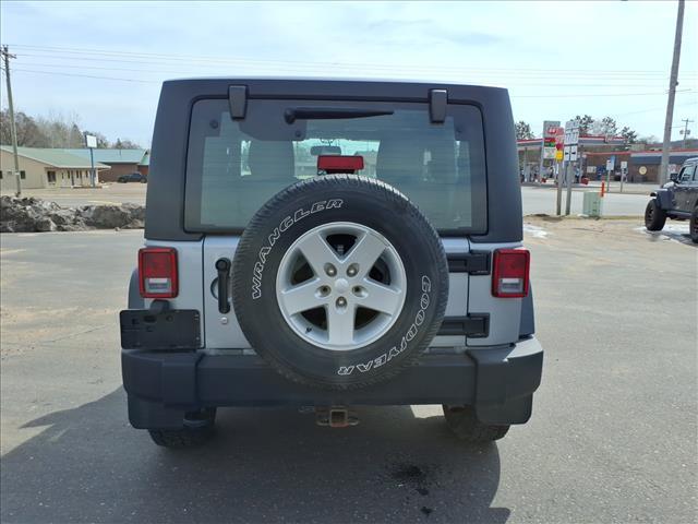 used 2015 Jeep Wrangler car, priced at $17,382