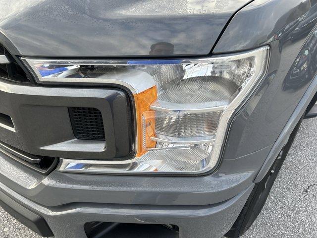 used 2018 Ford F-150 car, priced at $25,000