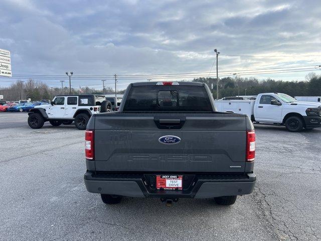 used 2018 Ford F-150 car, priced at $25,000