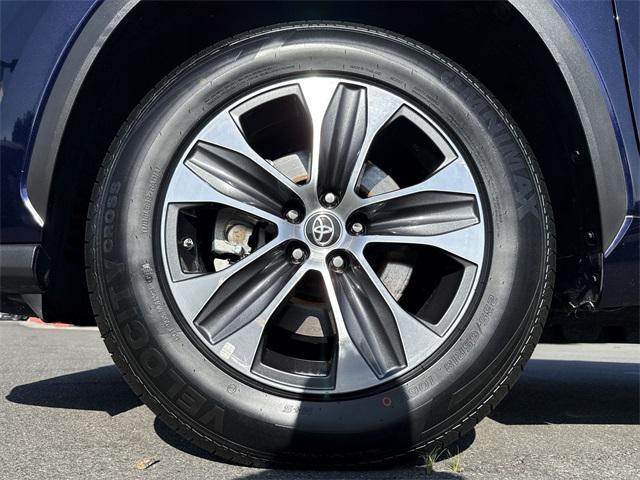 used 2020 Toyota Highlander Hybrid car, priced at $26,487