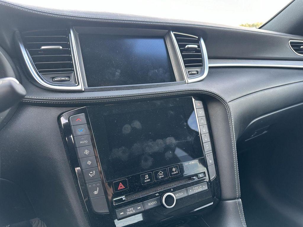 used 2021 INFINITI QX50 car, priced at $24,000