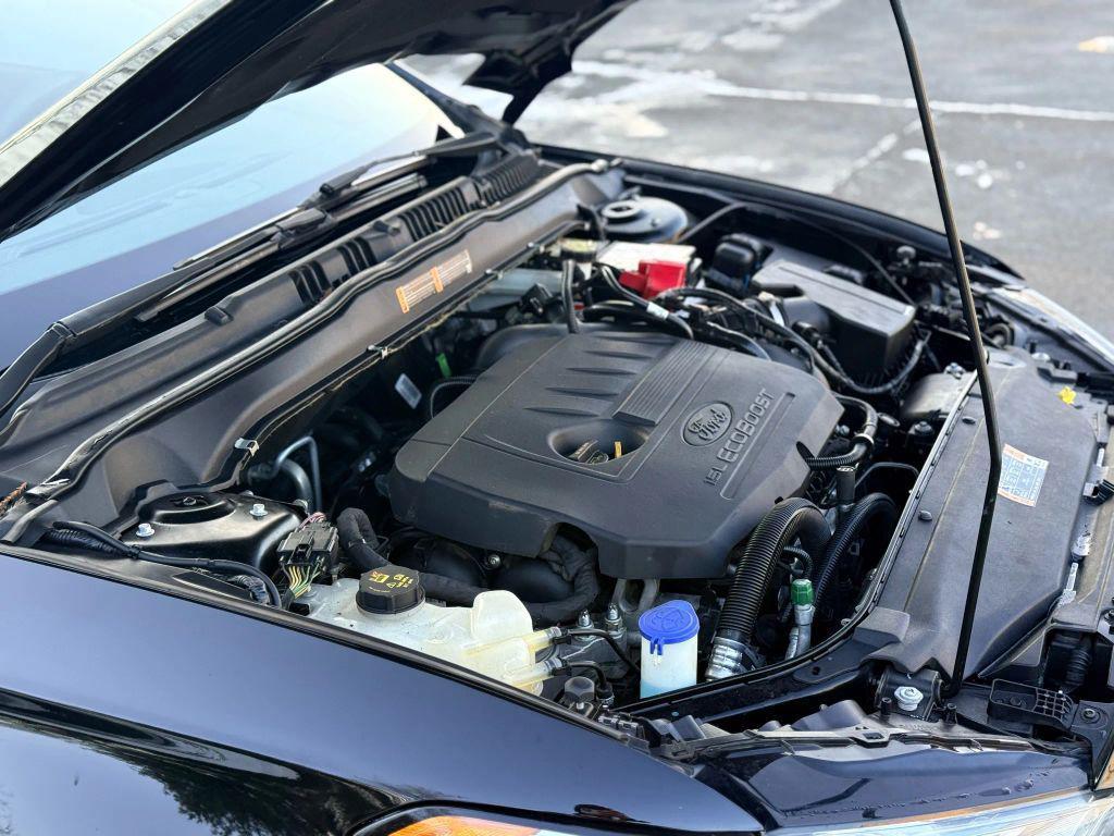 used 2018 Ford Fusion car, priced at $9,999