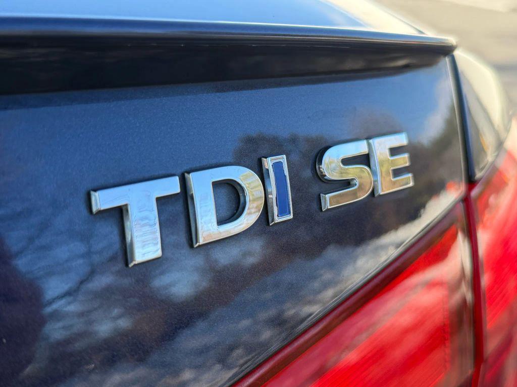 used 2014 Volkswagen Passat car, priced at $6,499