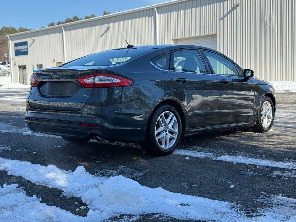 used 2016 Ford Fusion car, priced at $4,999