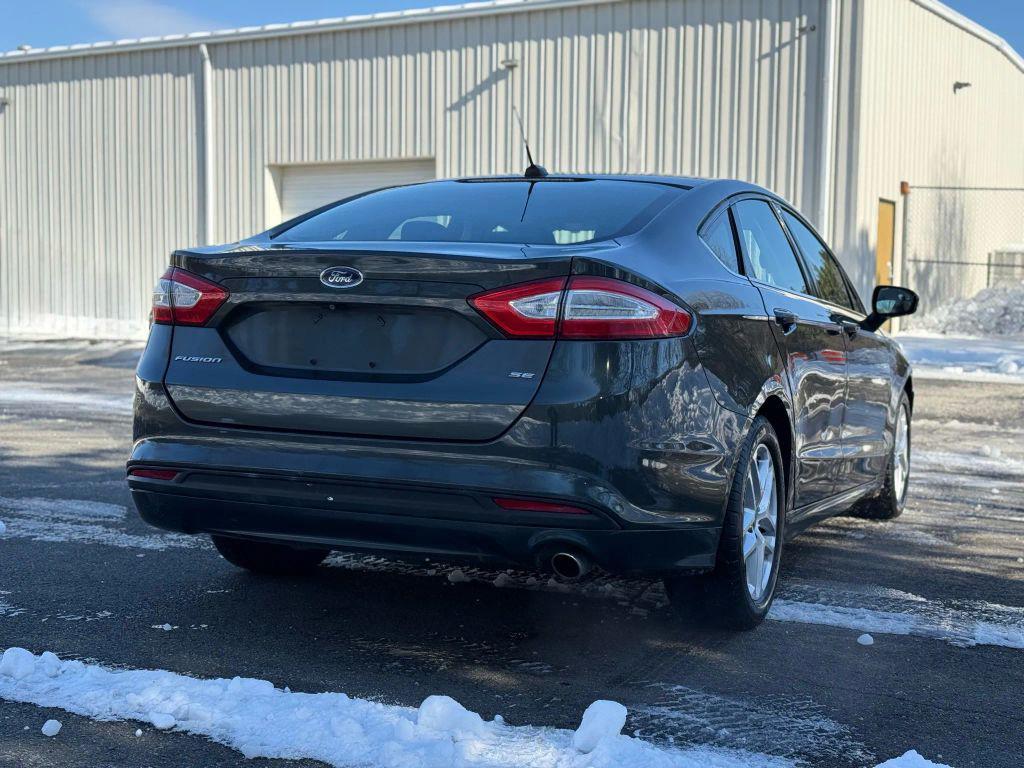 used 2016 Ford Fusion car, priced at $4,999