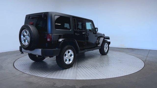 used 2013 Jeep Wrangler Unlimited car, priced at $16,471