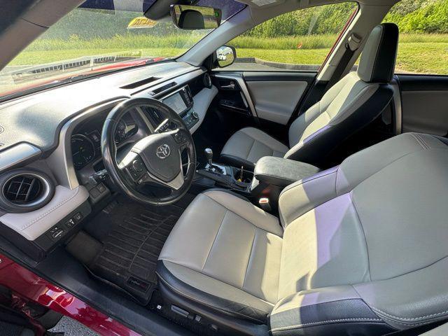 used 2018 Toyota RAV4 Hybrid car, priced at $23,231