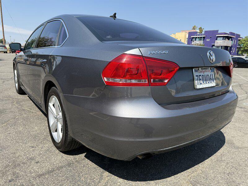used 2014 Volkswagen Passat car, priced at $5,879