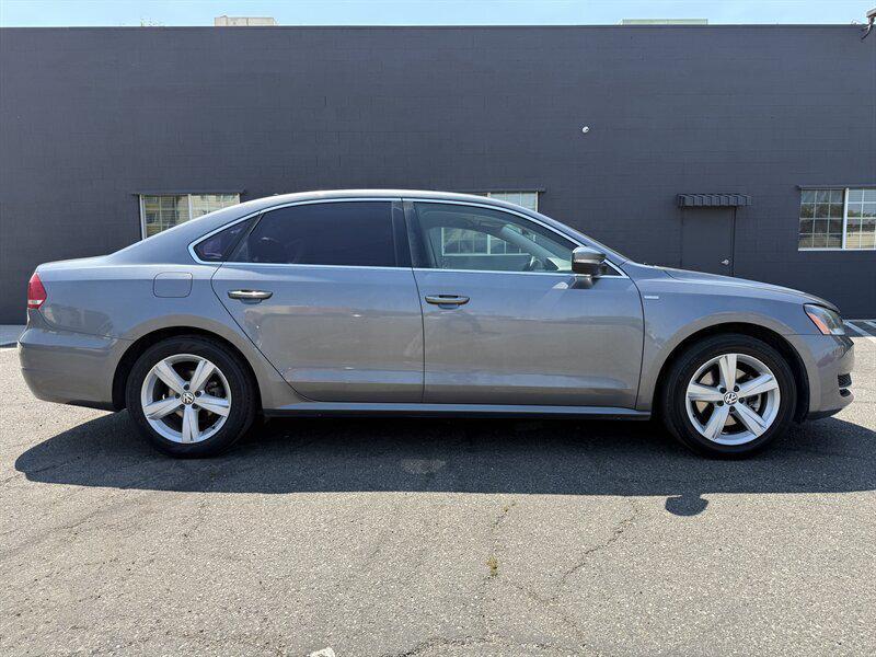 used 2014 Volkswagen Passat car, priced at $5,879