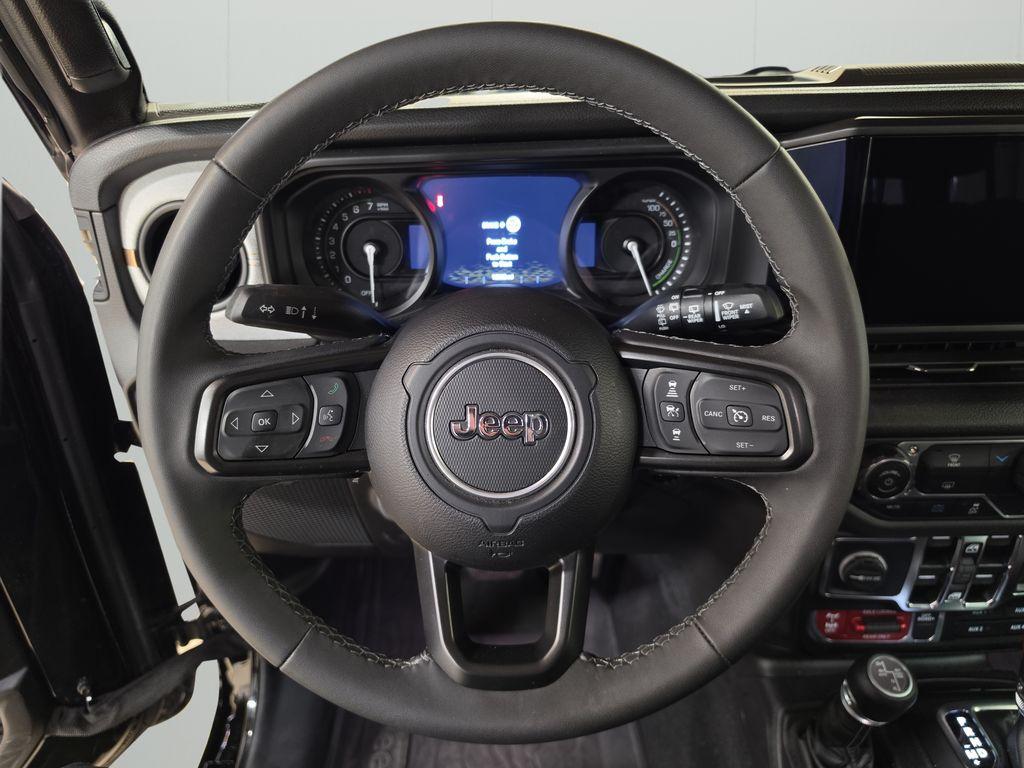 used 2025 Jeep Wrangler 4xe car, priced at $30,199