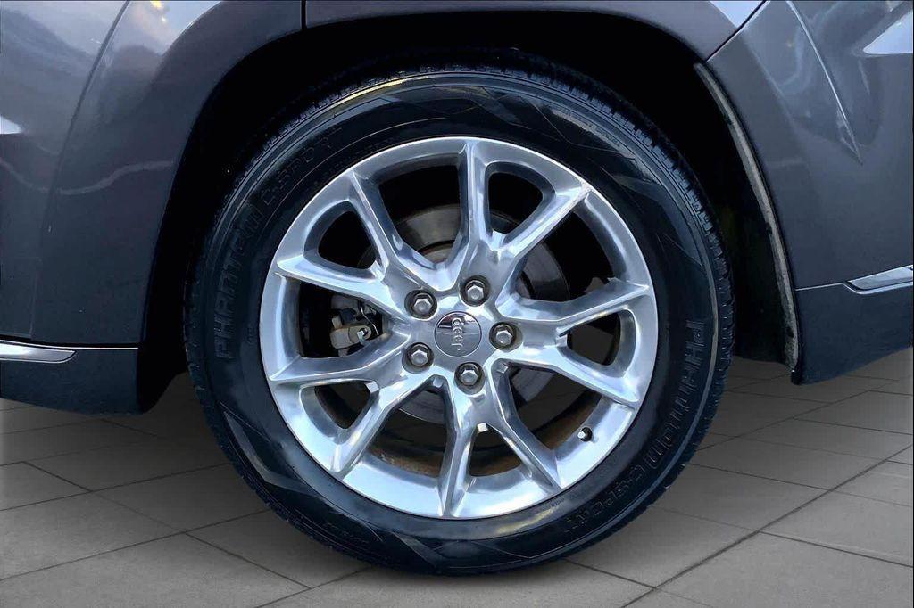 used 2014 Jeep Grand Cherokee car, priced at $12,948