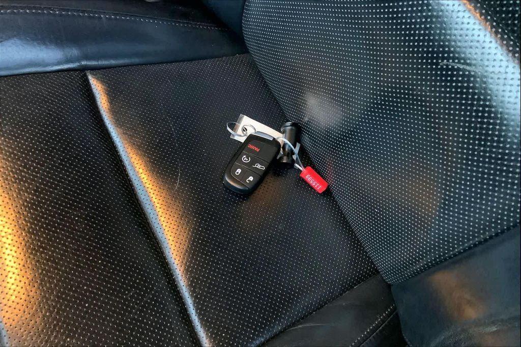 used 2014 Jeep Grand Cherokee car, priced at $12,948