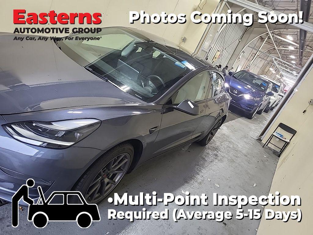 used 2023 Tesla Model 3 car, priced at $23,390