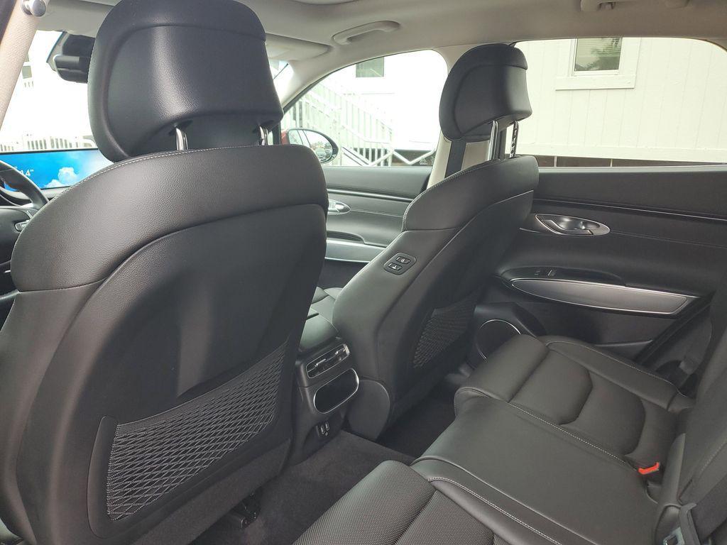 used 2023 Genesis GV70 car, priced at $34,177