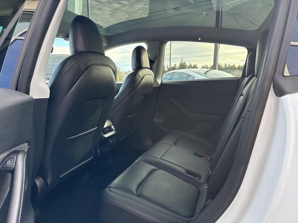 used 2021 Tesla Model Y car, priced at $27,590