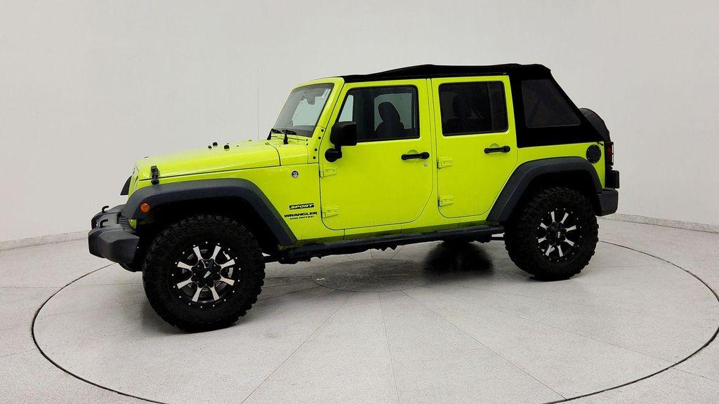 used 2016 Jeep Wrangler Unlimited car, priced at $16,991