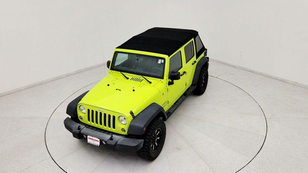 used 2016 Jeep Wrangler Unlimited car, priced at $16,991