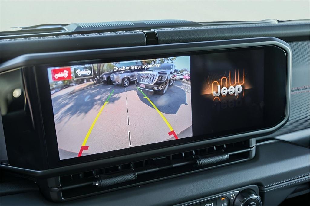 used 2024 Jeep Wrangler car, priced at $49,498