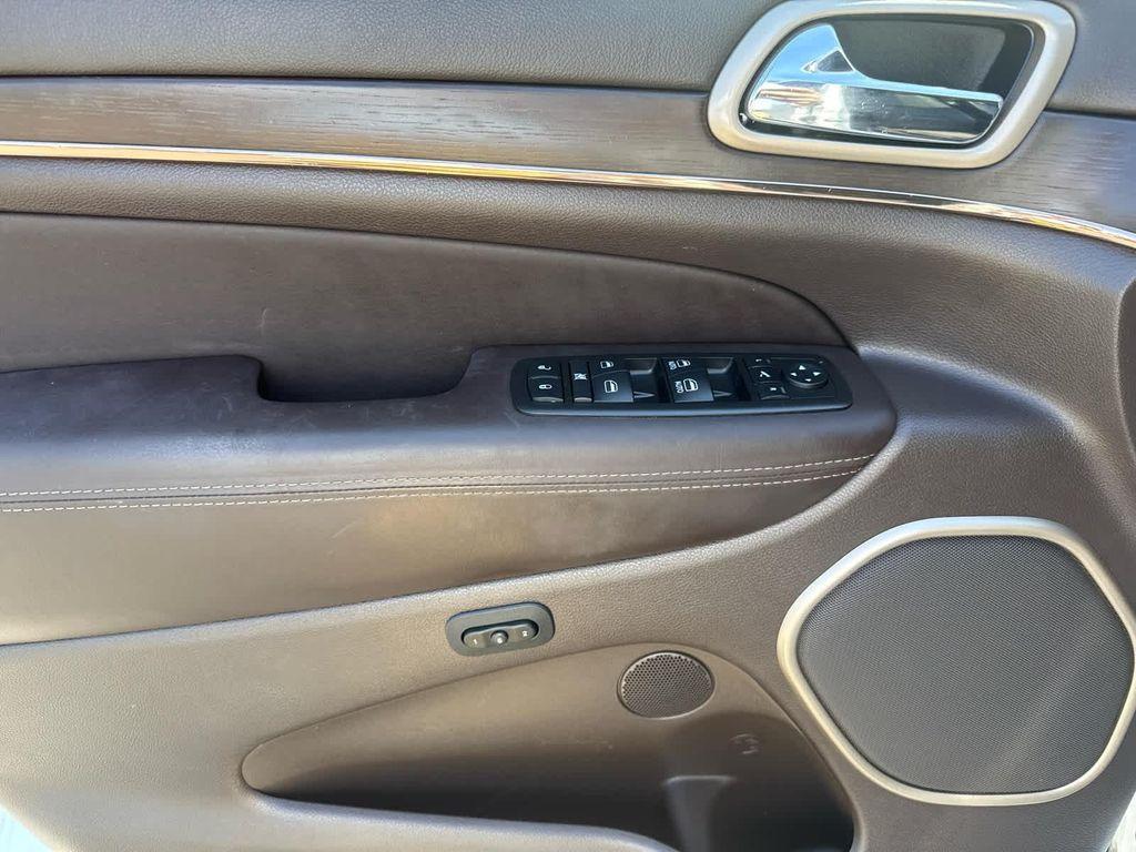 used 2014 Jeep Grand Cherokee car, priced at $14,752