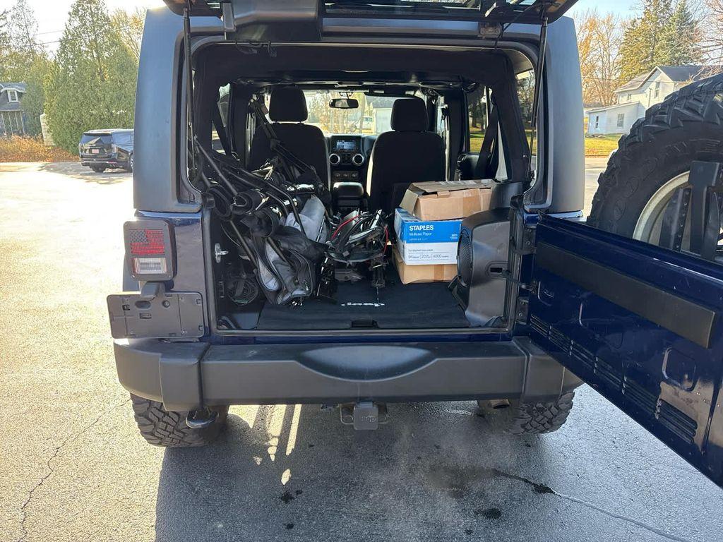 used 2013 Jeep Wrangler Unlimited car, priced at $17,952