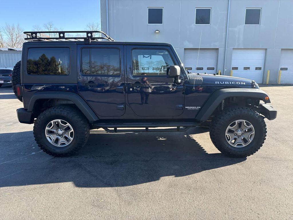 used 2013 Jeep Wrangler Unlimited car, priced at $17,952