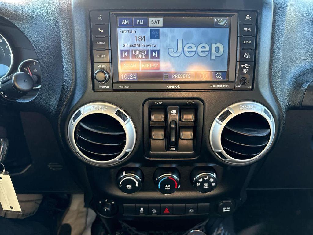 used 2013 Jeep Wrangler Unlimited car, priced at $17,952