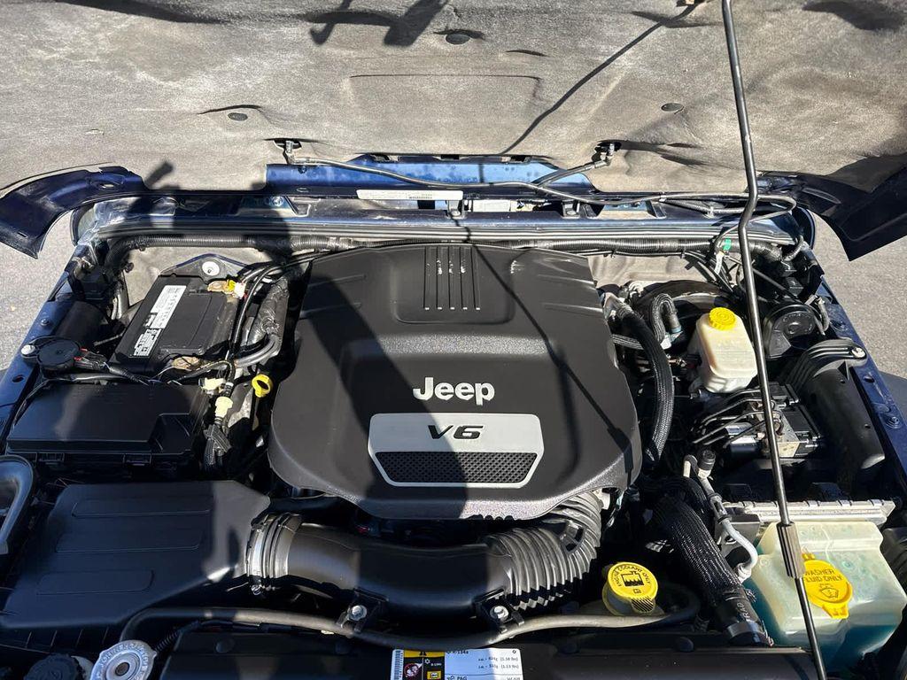 used 2013 Jeep Wrangler Unlimited car, priced at $17,952