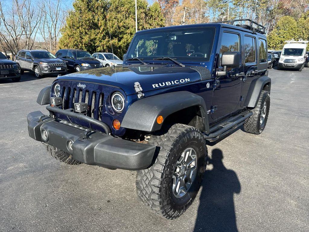 used 2013 Jeep Wrangler Unlimited car, priced at $17,952