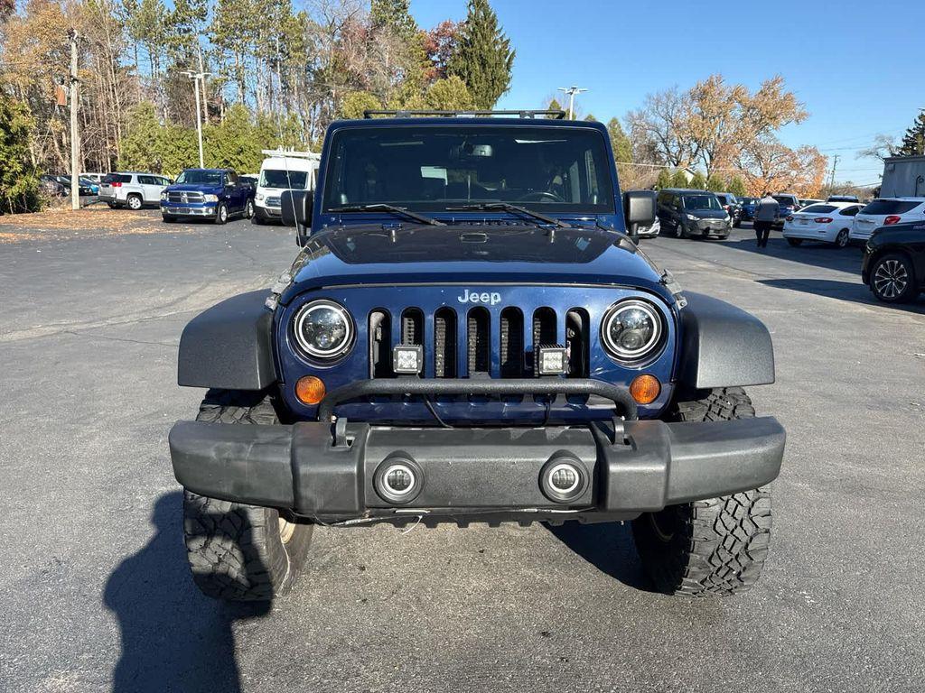 used 2013 Jeep Wrangler Unlimited car, priced at $17,952