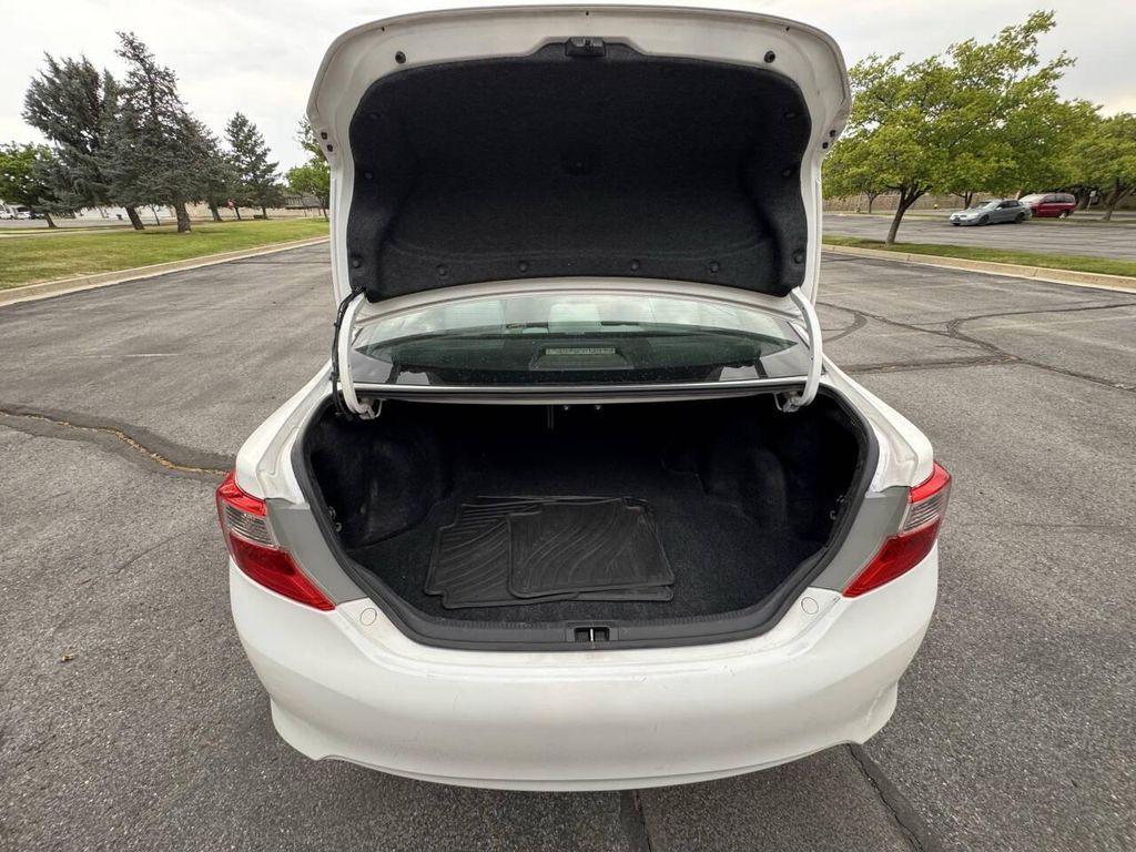 used 2014 Toyota Camry car, priced at $7,000