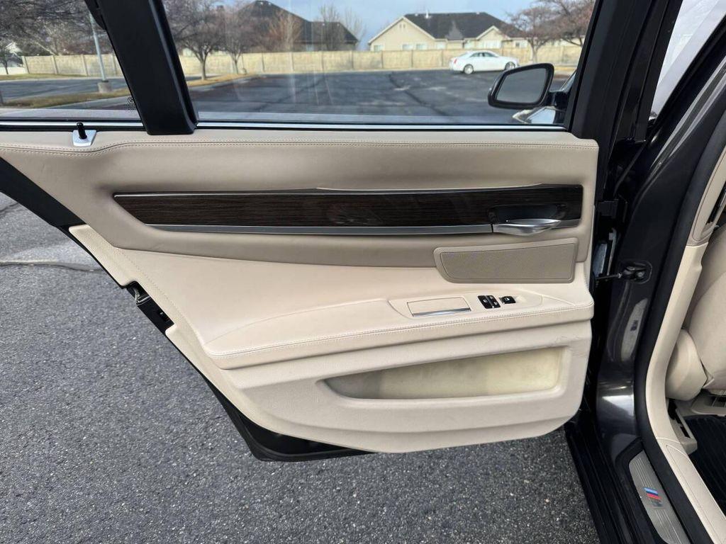 used 2013 BMW 750 car, priced at $5,000