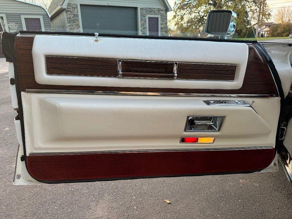 used 1976 Cadillac DeVille car, priced at $24,995