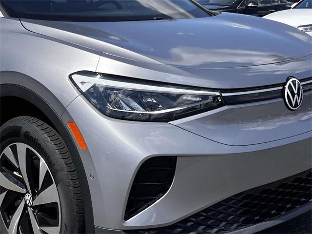 used 2023 Volkswagen ID.4 car, priced at $19,495