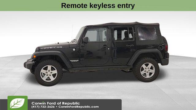 used 2011 Jeep Wrangler Unlimited car, priced at $15,899