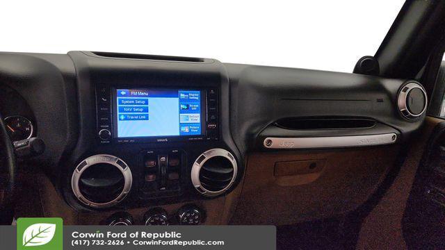 used 2011 Jeep Wrangler Unlimited car, priced at $15,899