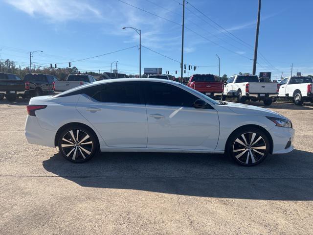 used 2022 Nissan Altima car, priced at $15,000