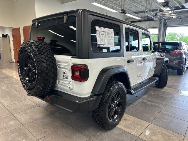 used 2022 Jeep Wrangler Unlimited car, priced at $33,948