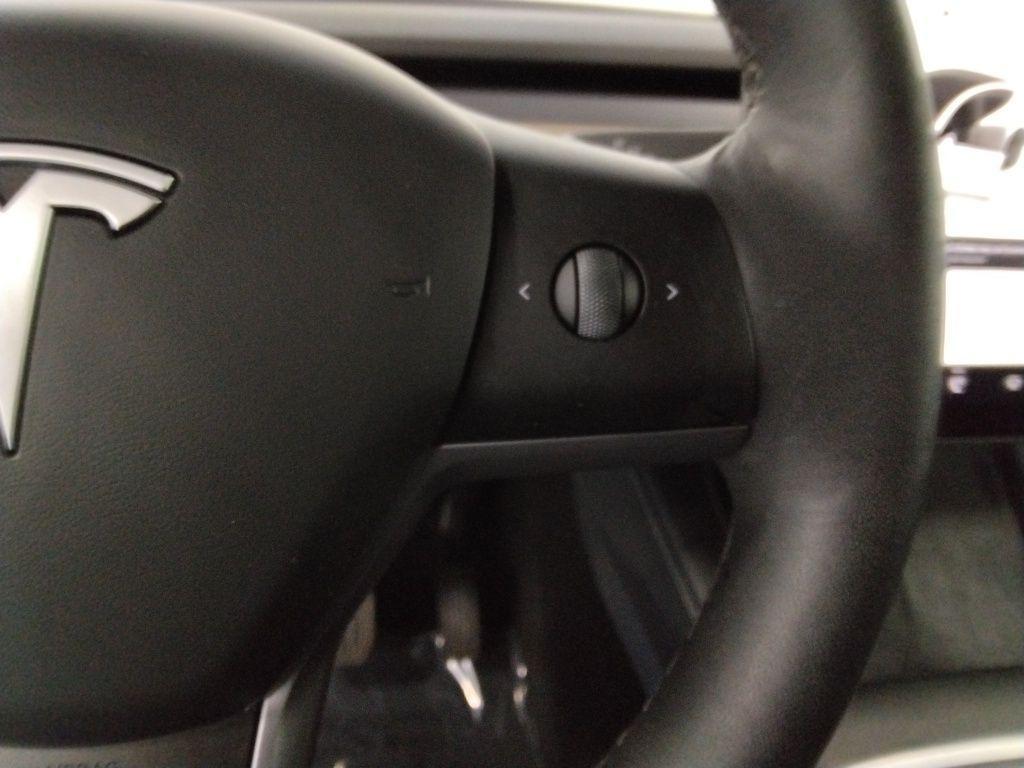 used 2024 Tesla Model Y car, priced at $31,900