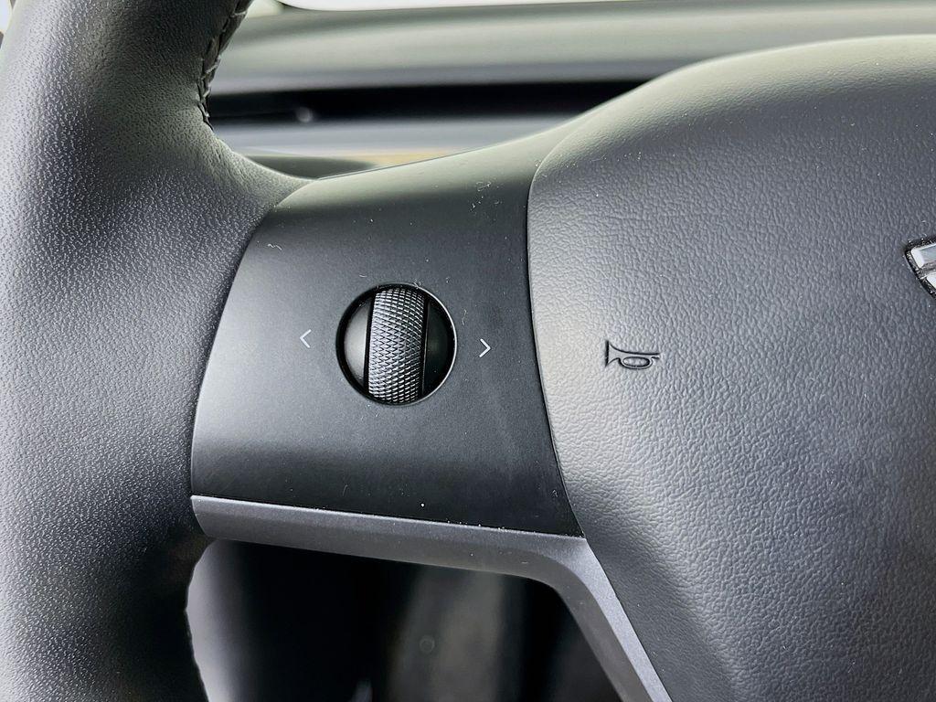 used 2023 Tesla Model 3 car, priced at $27,200