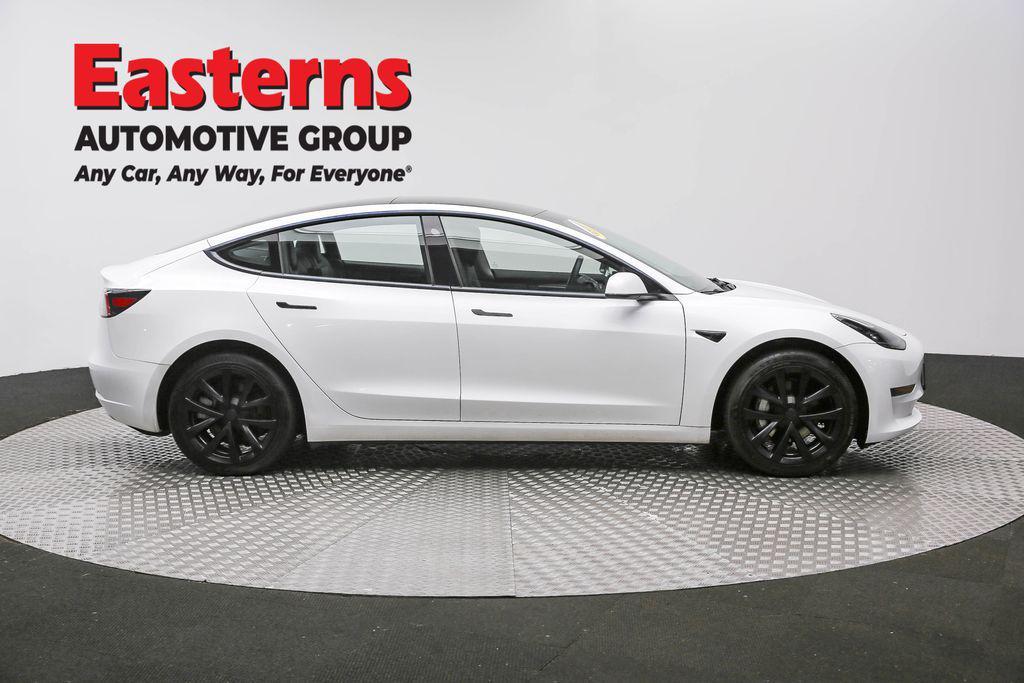 used 2023 Tesla Model 3 car, priced at $20,175