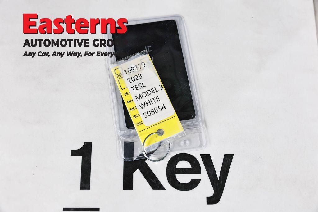 used 2023 Tesla Model 3 car, priced at $22,075