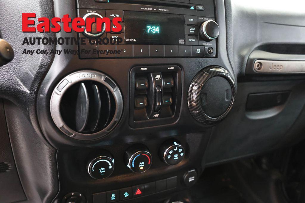 used 2016 Jeep Wrangler Unlimited car, priced at $16,549