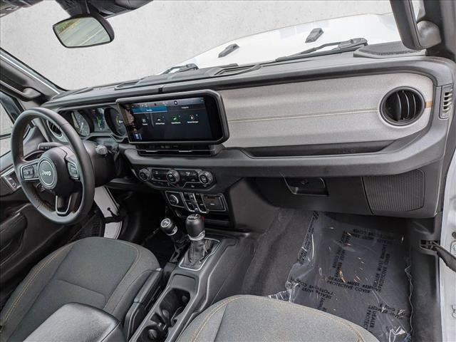 used 2024 Jeep Wrangler 4xe car, priced at $27,455