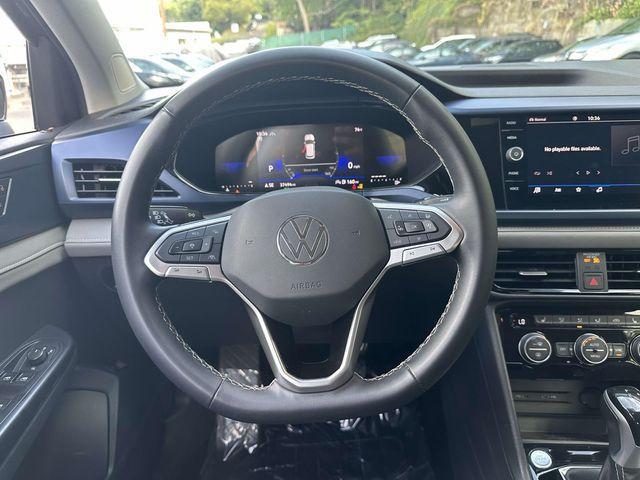used 2024 Volkswagen Taos car, priced at $18,595